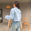 Cropped light blue denim jacket